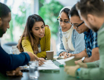 Professional Migration Agent Brisbane team providing expert guidance and immigration support in a collaborative setting, helping individuals achieve their Australian visa goals.